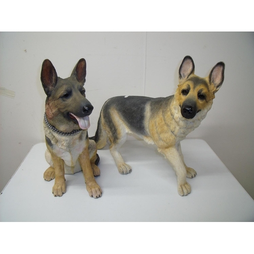 67 - Two large composite figures of Alsatians (approx. 42cm high)