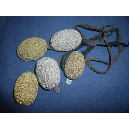 104 - Pair of silver coloured braided bullion Hussars boots dress knots and three similar gold coloured kn... 