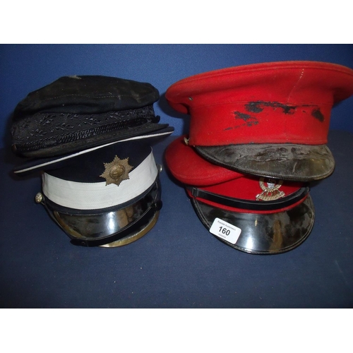 160 - Group of four military peaked caps including two scarlet cavalry caps,  Coldstream Guards and anothe... 
