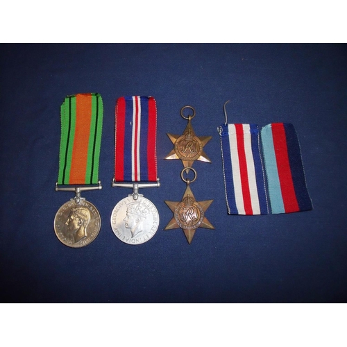 2 - Group of four WWII medals comprising of 39-45 Star, France & Germany Star, War & Defence Medals (4)