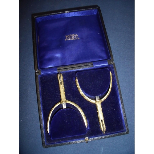28 - Presentation cased set of gilt metal spurs stamped Maxwell