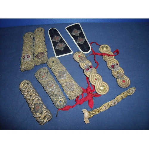40 - Selection of various cavalry and other officers epaulettes and a Generals collar tab