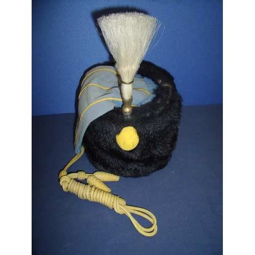 62 - Victorian Yeomanry Busby with yellow corded detail with blue & yellow corded bag and white hackle
