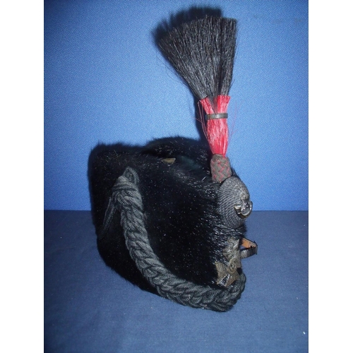 63 - Pre 1914 black fur Busby with red & black plume with original leather interior sweat band and traces... 
