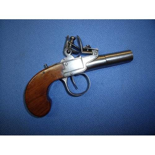 681 - Flintlock pocket pistol with 1 1/2 inch turn off barrel and top slide safety, no visible makers name