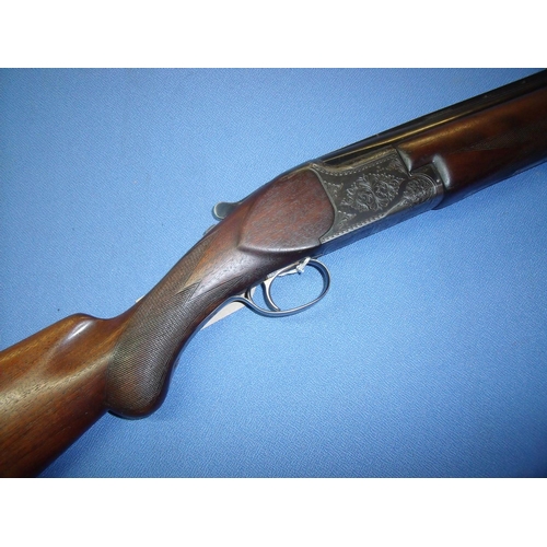 776 - Miroku 12 bore over & under single trigger ejector shotgun with 28 inch barrels, choke full & 1/4, w... 