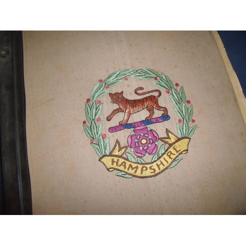 78 - Large album relating to the Hampshire Regiment, the title page with embroidered Hampshire Regimental... 