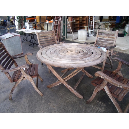 1 - Large circular wooden outdoor table and four chairs