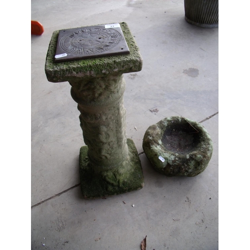 31 - Piece of hollowed out dressed stone suitable to be a bird bath and a sundial on a decorative concret... 