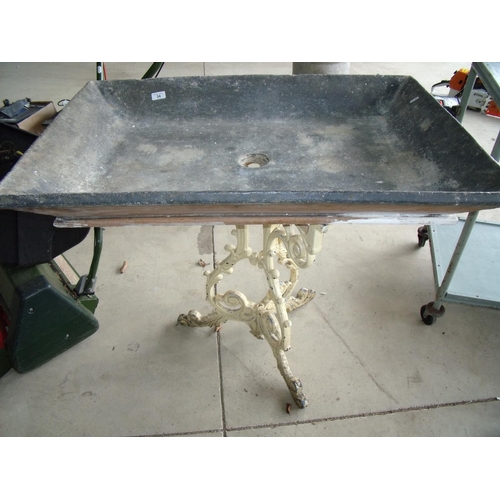 34 - Large wooden lead lined sink on a cast metal stand