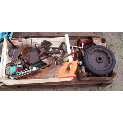 67 - Two boxes of various hand tools, saws, wheelbarrow wheel etc