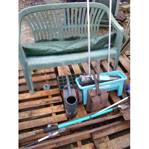 79 - Two seater plastic garden bench and a small selection of garden tools