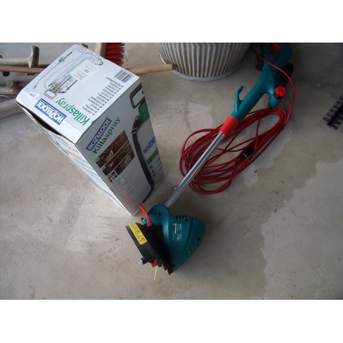 82 - Bosch Combi-Trim strimmer, two small plastic watering cans and a Hozelock Killaspray