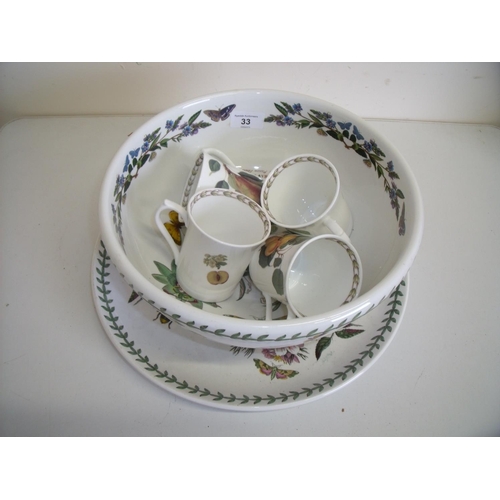 33 - Large Portmeirion Botanical Garden bowl, charger and set of four mugs