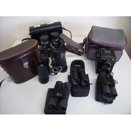 40 - Box containing a selection of camera equipment including a Nomo Lubitel 166, various binoculars etc