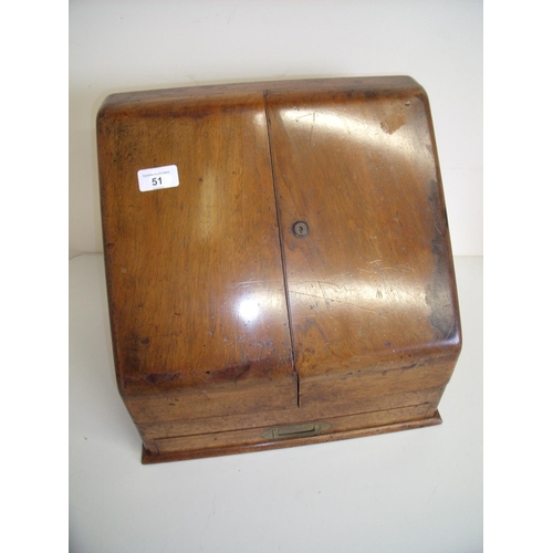 51 - Edwardian walnut stationary box with hinged lift up compartment above two folding sloped front doors... 