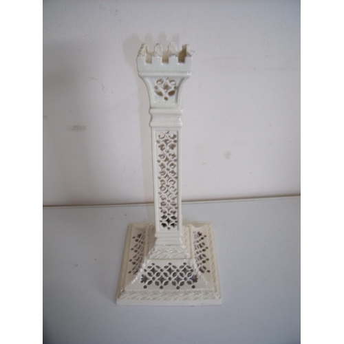 6 - Leeds Pottery cream ware candlestick with latticework detail, square base and column, with castellat... 
