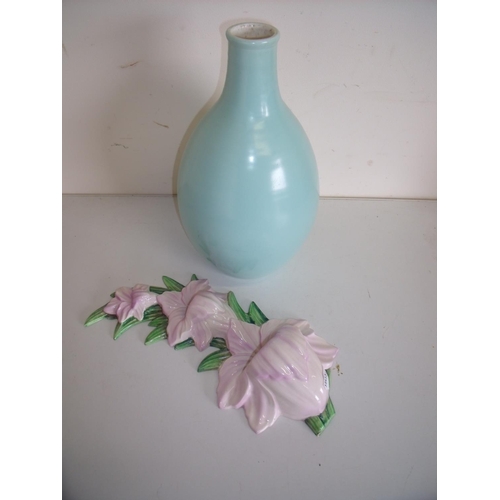 7 - Large Poole pottery bottle neck vase No. 691 (30cm high) and a Carltonware No. 1744 lily wall plaque... 