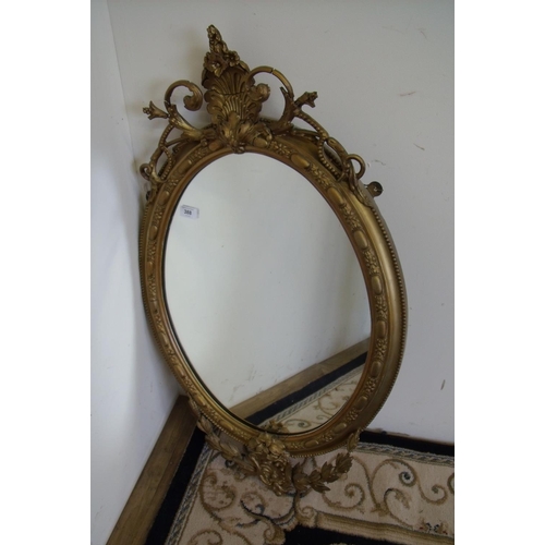 325 - Late 19th C gilt frame oval wall mirror (97cm x 56cm)