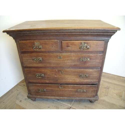 321 - 19th C oak chest with stepped cornice above two short and three long drawers (102cm x 57cm x 100cm)