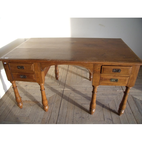 312 - Late Victorian elm writing table with two drawers to each pedestal on turned supports (152cm x 91cm ... 