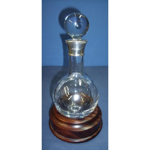 214 - Modern Birmingham silver hallmarked collared glass decanter, the oval body with circular stopper wit... 