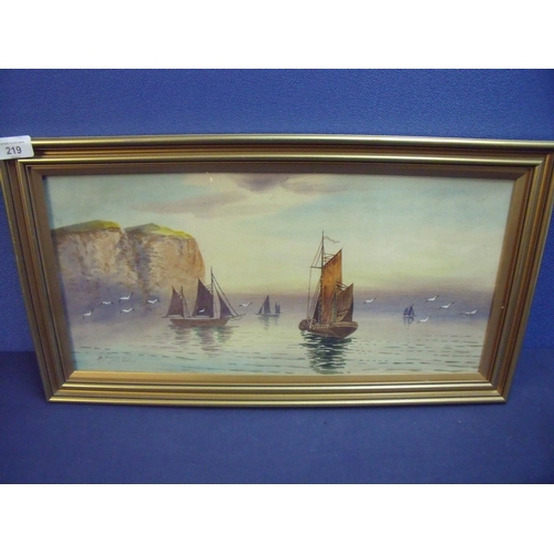 219 - Gilt framed watercolour of fishing boats off cliffs with seagulls to the foreground signed H.B Davis... 