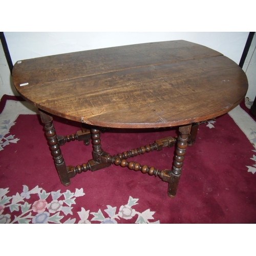 284 - 18th/19th C oak dropleaf gate-leg table on bobbin turn supports with single drawer to the end (lengt... 