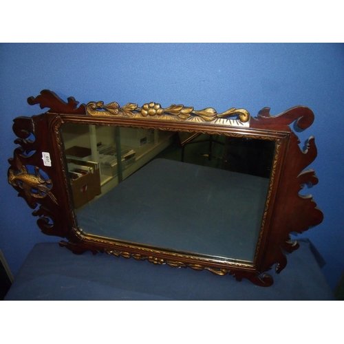 285 - Early 19th C style mahogany and gilt-framed wall mirror with gilded eagle pediment (50cm x 80cm)