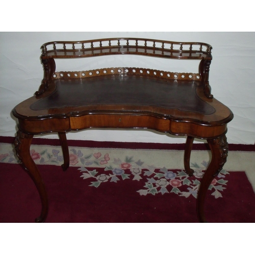 301 - Victorian rosewood ladies writing desk with raised galley back, inset leather surface and single fri... 