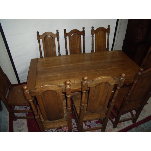 316 - Superb quality oak reproduction refectory-style table and a set of eight panel back dining chairs wi... 