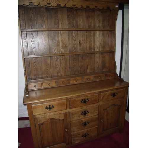 317 - Quality modern oak reproduction dresser with three-tier raised back with a bank of seven drawers abo... 