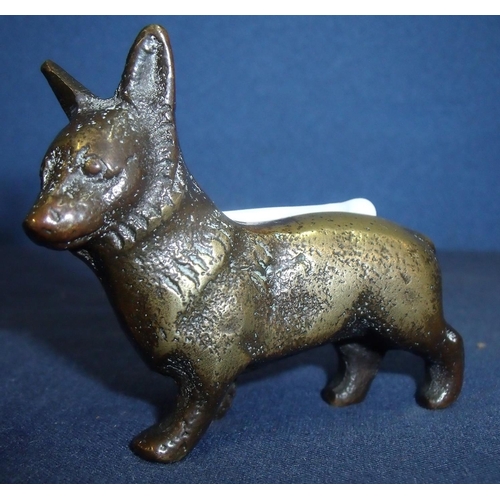 47 - Small cast bronze figure of a corgi type dog (5cm high)