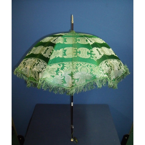 52 - 19th C ladies parasol with green silk work canopy and carved ivory finials (length 73cm)