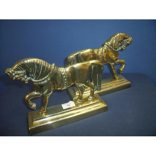 76 - Pair of 19th C brass fire side horses in harness on stepped rectangular bases (24cm x 7cm x 20cm)