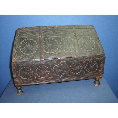 88 - 16th/17th C carved oak table casket, the top of arched form with lift up hinged panel with carved de... 