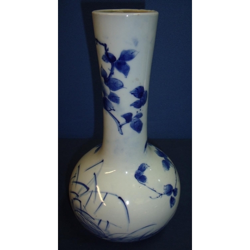 14 - Japanese blue & white bottleneck vase with nine digit signature panel to the base (28.5cm high)