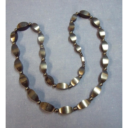 155 - Whitby jet carved faceted bead necklace (length 64cm)