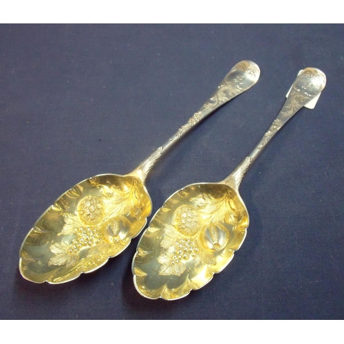 159 - Pair of London silver hallmarked tablespoons with later engraved detail and gilt embossed berries to... 