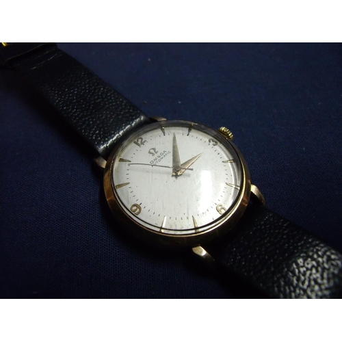 173 - 9ct gold cased Omega automatic (1012) gents wristwatch with black leather strap, number on plate 372... 