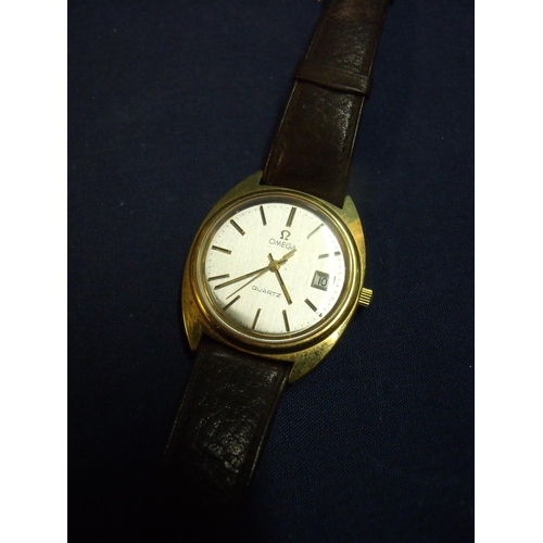 174 - Omega quartz gents wristwatch complete with brown leather Omega strap and buckle, with date dial to ... 