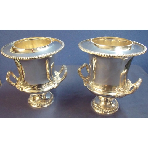 144 - A pair of Edwardian quality silver plated wine cooler urn-shaped buckets with lift-out liners with t... 