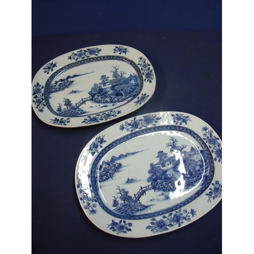 15 - Pair of 18th/19th C Chinese oval blue and white platters (35cm x 27cm x4cm)
