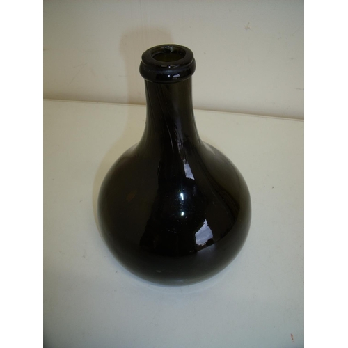 1 - Early onion shaped glass bottle with squat base, high pontil and marked J & B (height 18cm)