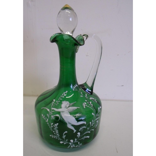 48 - Green and clear glass bottle decanter with loop handles and Mary Gregory style painted detail of a c... 