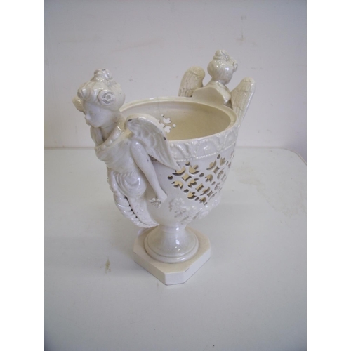 50 - Leeds Pottery Creamware urn mounted with two winged angels, the base with impressed marks for Leeds ... 