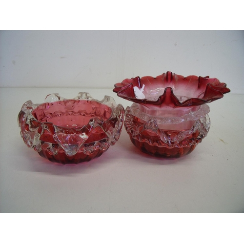 52 - Three cranberry and clear glass bowls