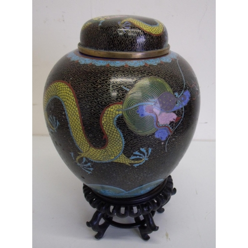 56 - Large cloisonné ginger jar decorated with dragons on carved wood base (height 28cm)