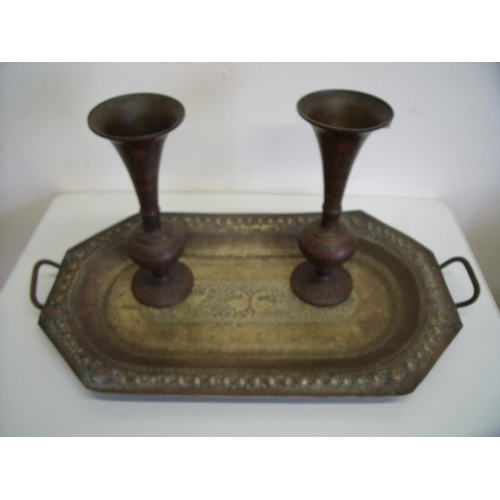 57 - Rectangular twin handled Indian style brass tray with embossed detail and a pair of flared top vases