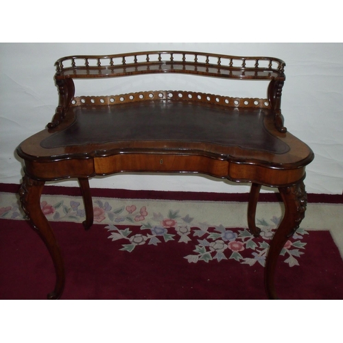 400 - Victorian rosewood ladies writing desk with raised galley back, inset leather surface and single fri... 